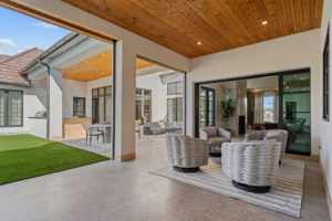 4632 Esprit – Walls of window open to the outdoor spaces, and outdoor kitchen.