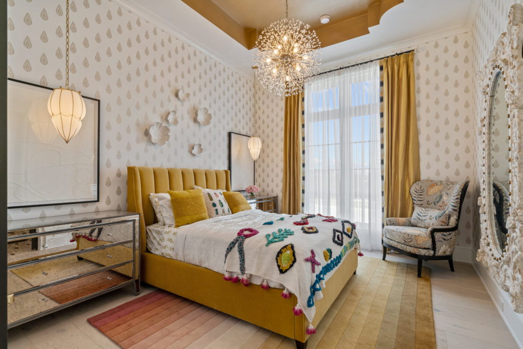 High design in a secondary suite includes its dramatic tray ceiling.