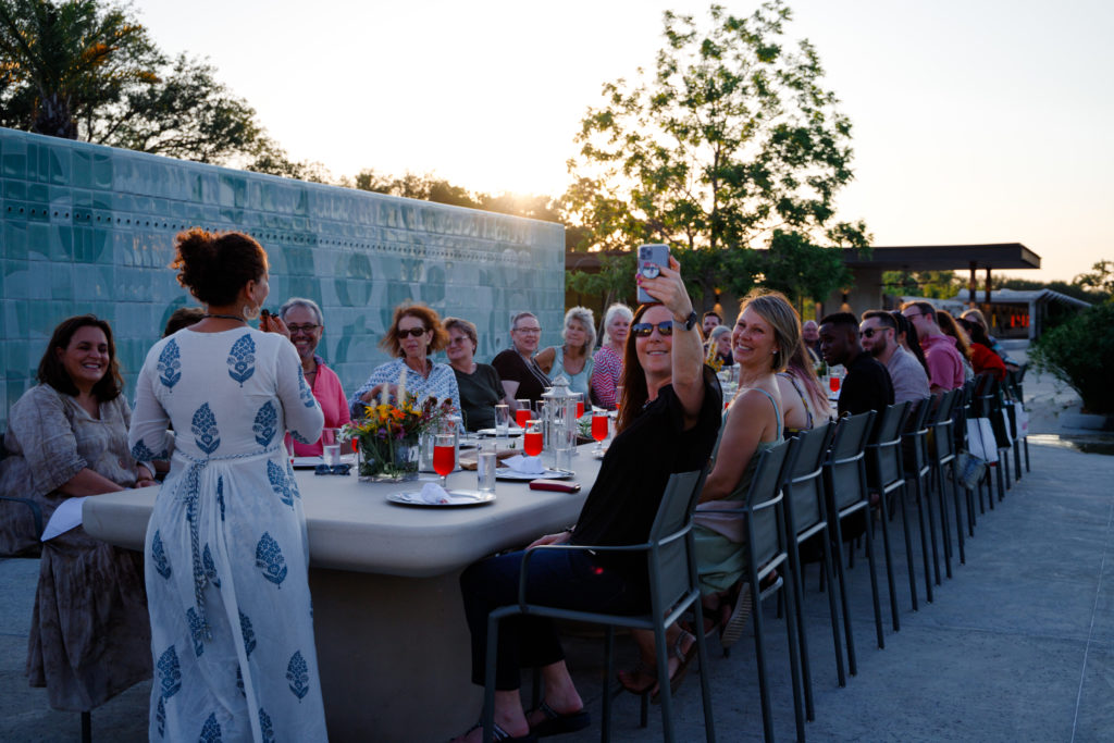 Attendees listened to chef Karuna Diedericks' remarks at the Summer Soulstice Dinner. (Photo by Liz Silva)