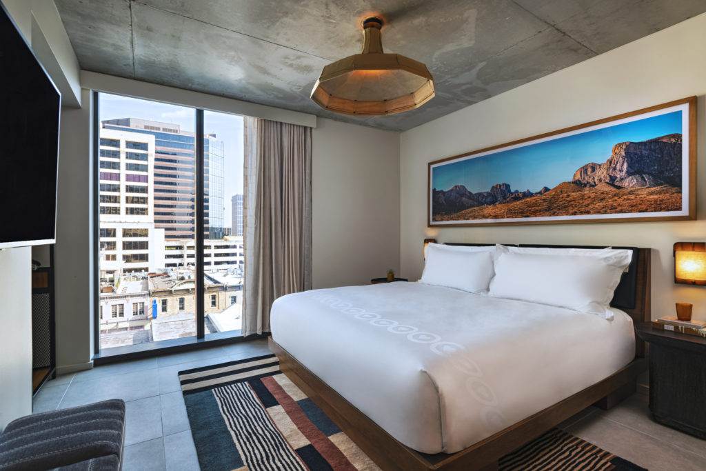 If you opt to stay at the tommie, guest rooms feature a panoramic image located above each bed shot by local photographer Kenny Braun. (Photo by Al Argueta)