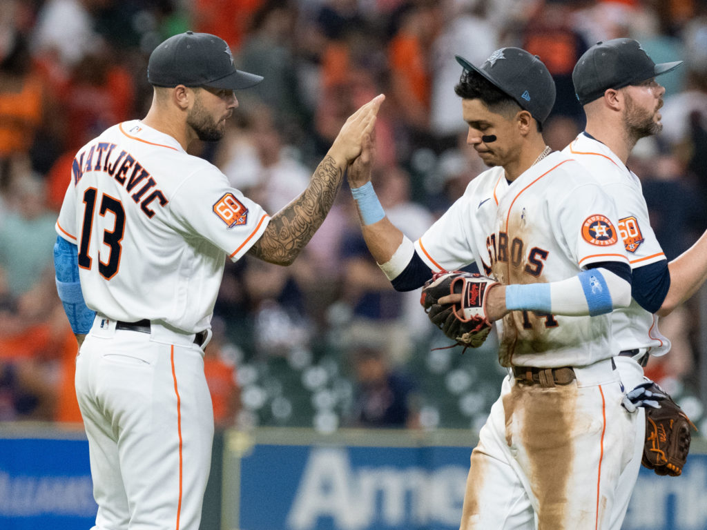 J.J. Matijevic and Mauricio Dubon powered the Astros to the ultimate Father's Day feel-good win. (Photo by F. Carter Smith)