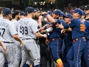 Houston Astros outfielder Yordan Alvarez, flanked by Astros general Manager James Click and a Spanish translator, announced a 6-year, $115 million contract extension that keeps the young Cuban slugger an Astro through 2028, at a Minute Maid Park news conf