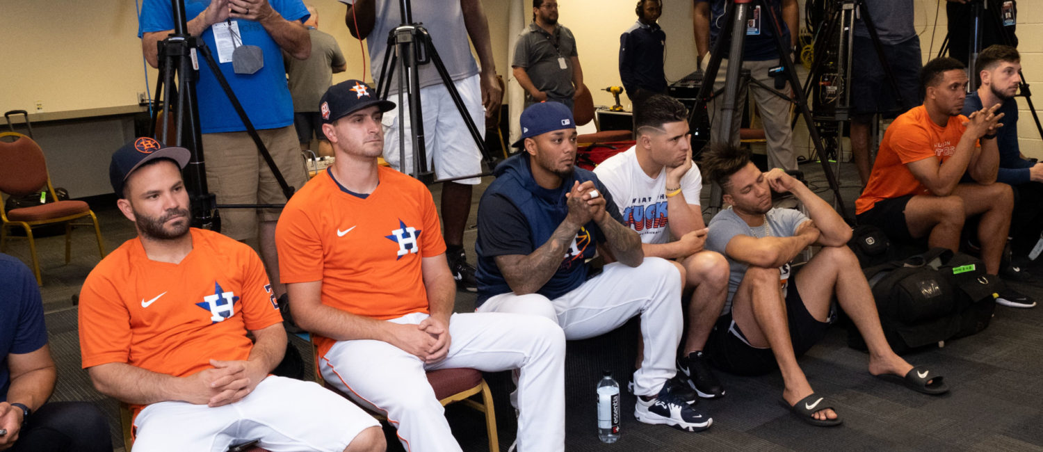 Houston Astros outfielder Yordan Alvarez, flanked by Astros general Manager James Click and a Spanish translator, announced a 6-year, $115 million contract extension that keeps the young Cuban slugger an Astro through 2028, at a Minute Maid Park news conf