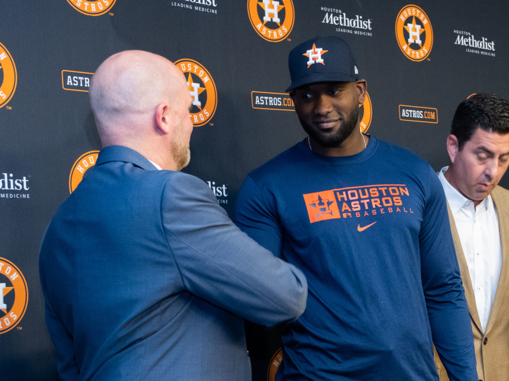Houston Astros general manager James Click congratulates Yordan Alvarez on his new $115 million Astros contract. (Photo by F. Carter Smith)