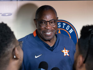 Houston Astros outfielder Yordan Alvarez, flanked by Astros general Manager James Click and a Spanish translator, announced a 6-year, $115 million contract extension that keeps the young Cuban slugger an Astro through 2028, at a Minute Maid Park news conf