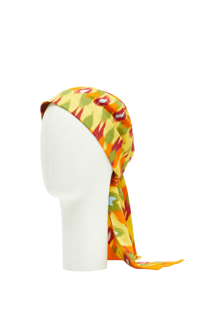 Valentino Cotton And Silk Headband With Round Rain Print, $570, Available at Neiman Marcus NorthPark (Courtesy of Valentino)