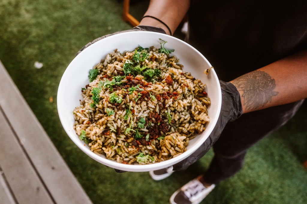 ChòpnBlọk's global cuisine: Liberian rice and greens. (Photo by William Issac)