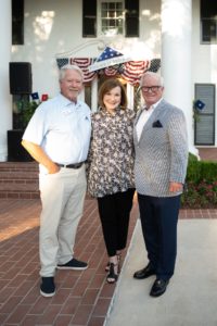 Folds – Mike Beltz, Chairman of the Board of Folds of Honor; Lori and Larry Allen. Photo by Danny Campbell 97