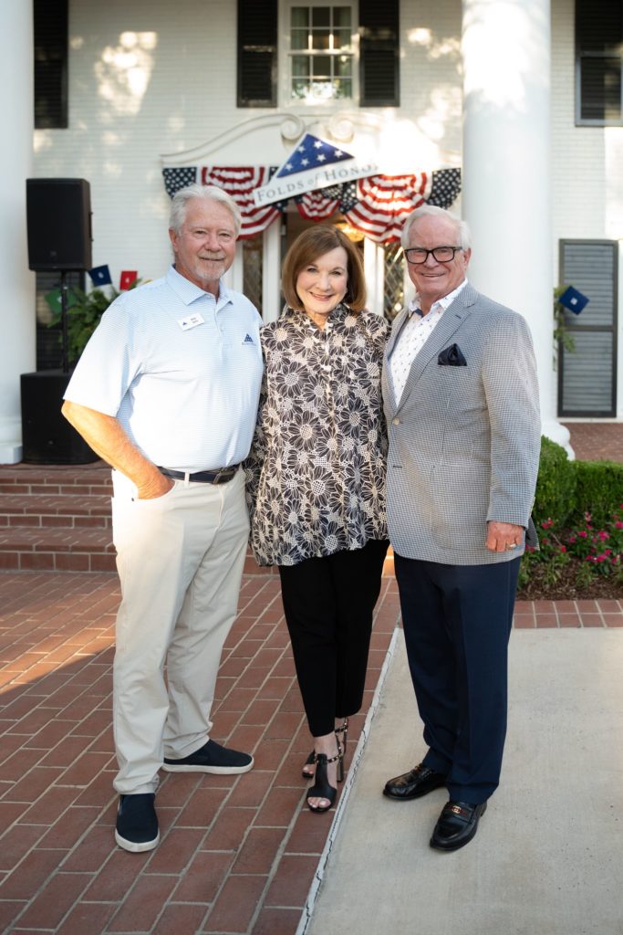Mike Beltz, Chairman of the Board of Folds of Honor with Lori and Larry Allen. Photo by Danny Campbell.