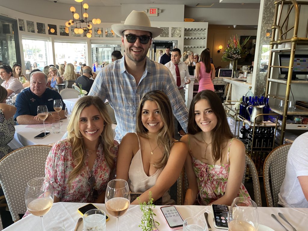 Troup Rolland, standing, Madison Marchbanks, Megan Rodriguez, Kirby Wheat at the Brasserie 19 Rosé All Day bash. (Photo by Shelby Hodge)