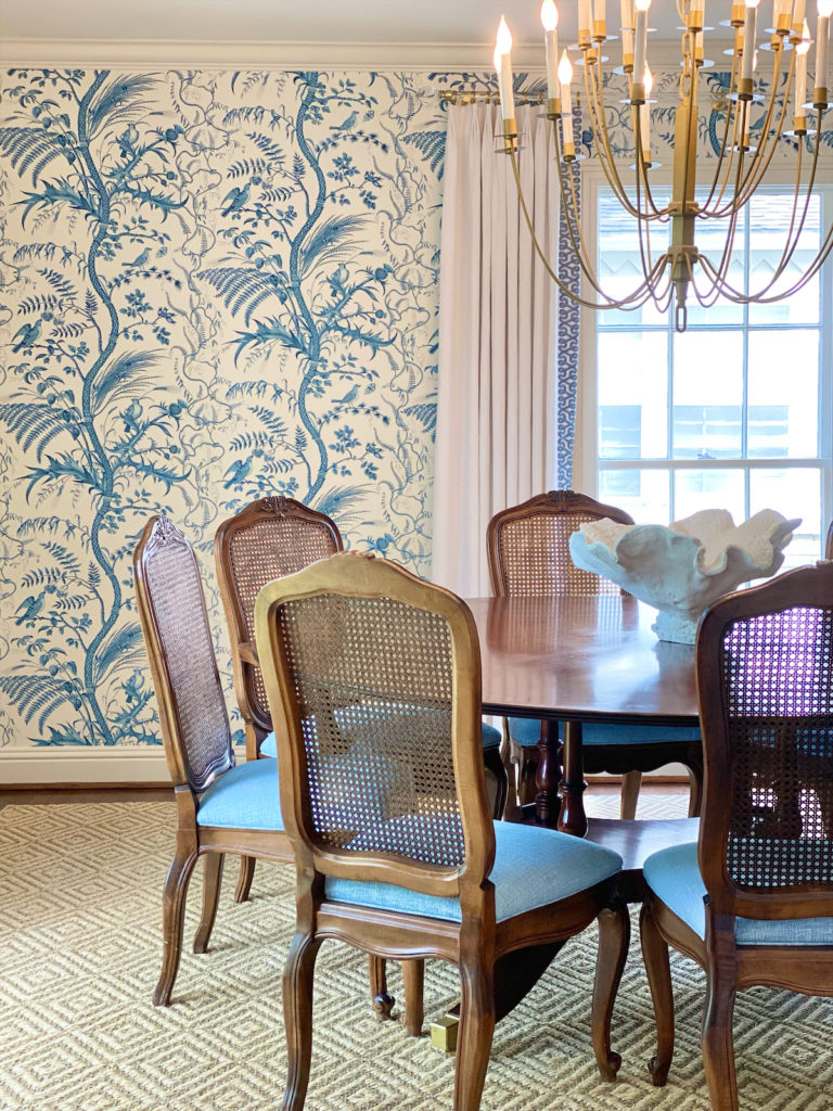 The Carrolls' dining room is wallpapered in Brunschwig & Fils' "Bird and Thistle."