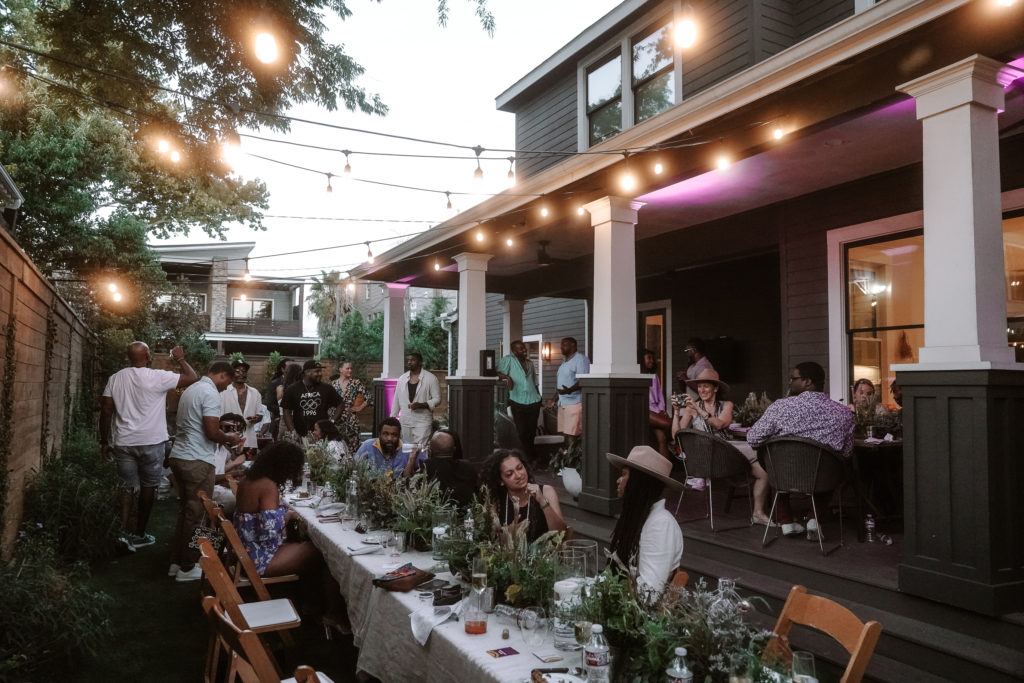 Guests dined under a canopy of lights to at CoolxDad's 2022 Juneteenth dinner. (Photo by William Issac)