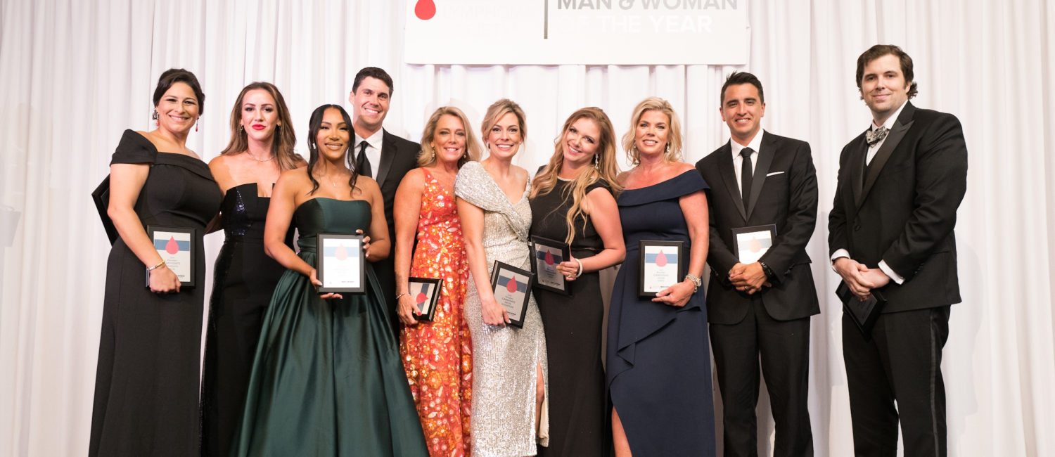 Guests at the 2022 Leukemia & Lymphoma Society Man & Woman of the Year announcement party cheer the record proceeds. (Photo by Daniel Ortiz)