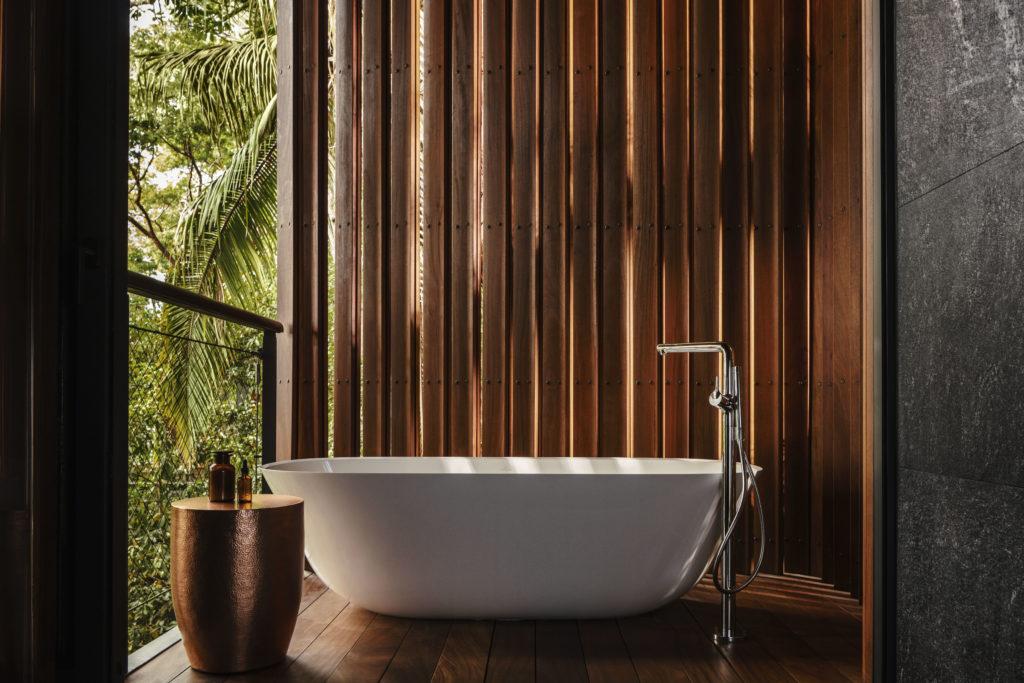 The ultra lux tree houses and villas at One & Only Mandarina boast serene outdoor bathtubs. 
