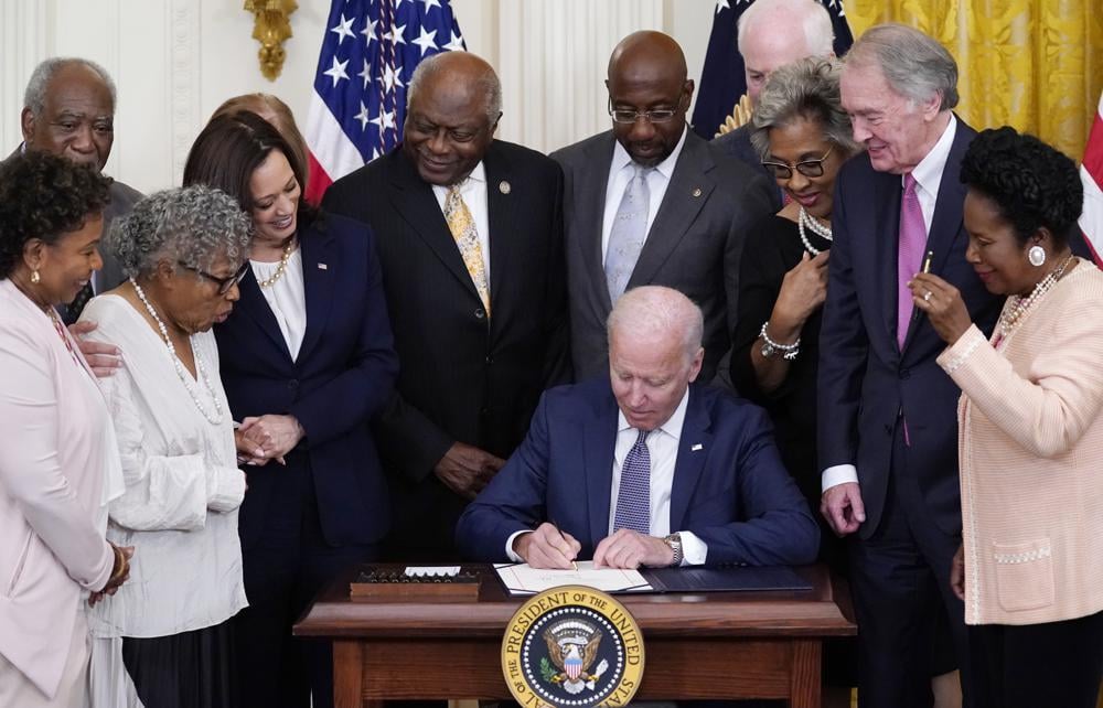 Opal Lee looks on as Juneteenth is signed into law becoming a national holiday.