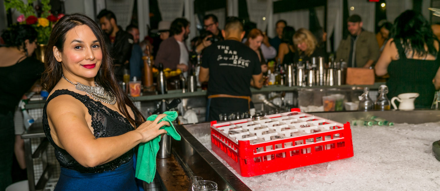 Julep owner and award winning mixologist Alba Huerta behind the bar in her flagship that has won the national James Beard Award of Outstanding Bar Program. (Photo by Emily Jaschke)