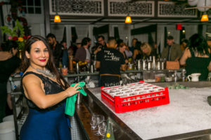 Julep owner and award winning mixologist Alba Huerta behind the bar in her flagship that has won the national James Beard Award of Outstanding Bar Program. (Photo by Emily Jaschke)