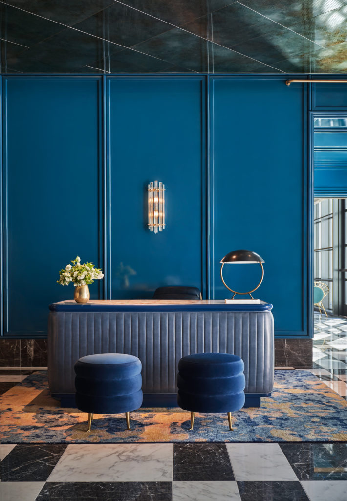 Martin Brudnizki's choice of bold blue walls for the lobby. (Photo by Christian Horan)