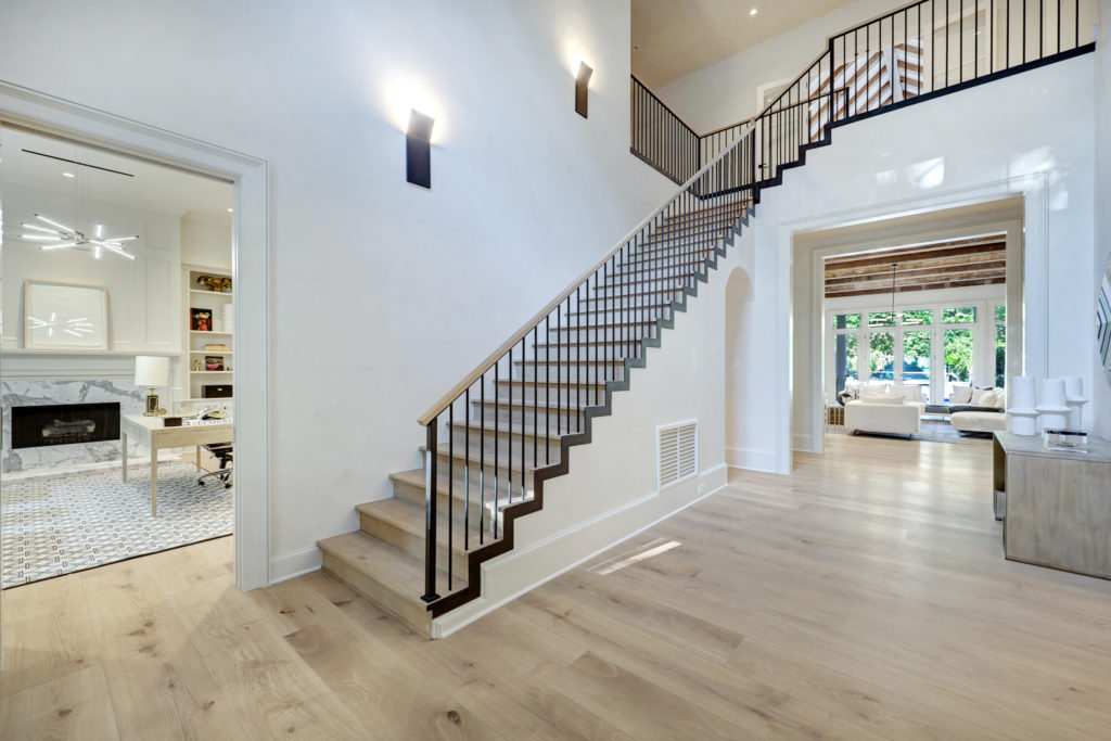 Wide plank European oak flooring is one of many changes in the home at 402 Timberwilde Lane (Photo by TK Images)