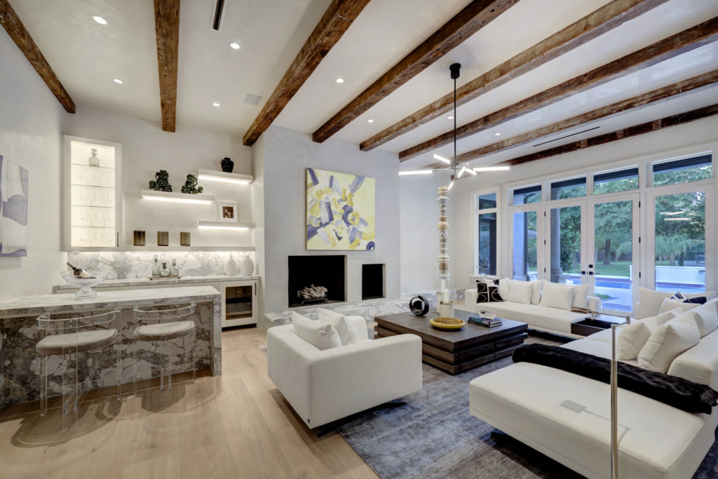 The 100 year old beans add character to the great room at 402 Timberwilde Lane. (Photo by TK Images)