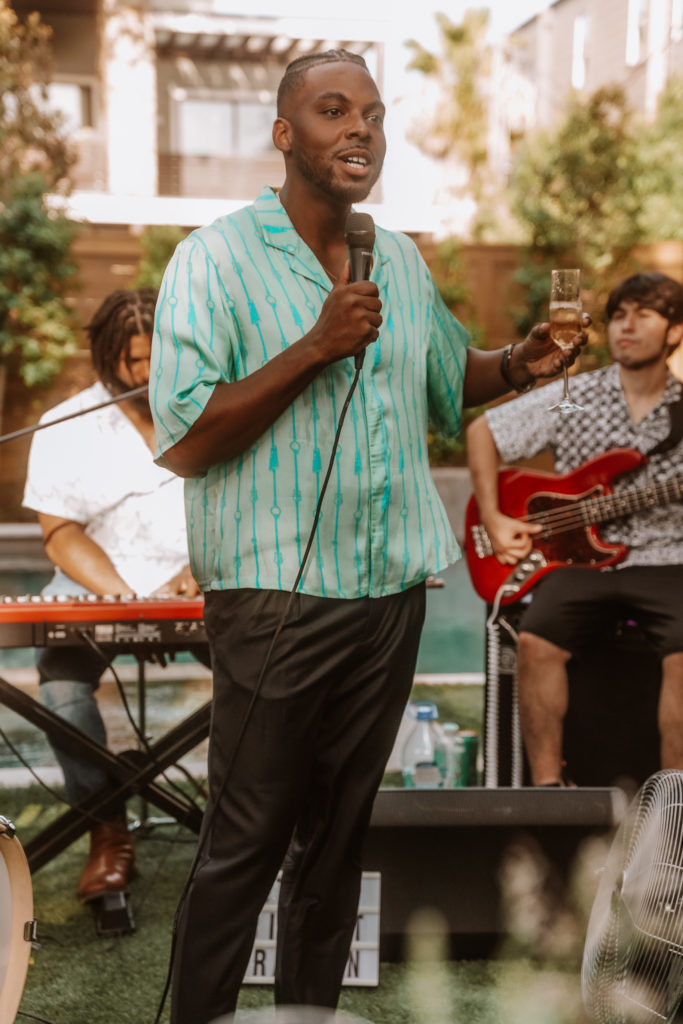 Host Troy Hamm welcomes guests and extolls CoolxDad's mission. (Photo by William Issac)