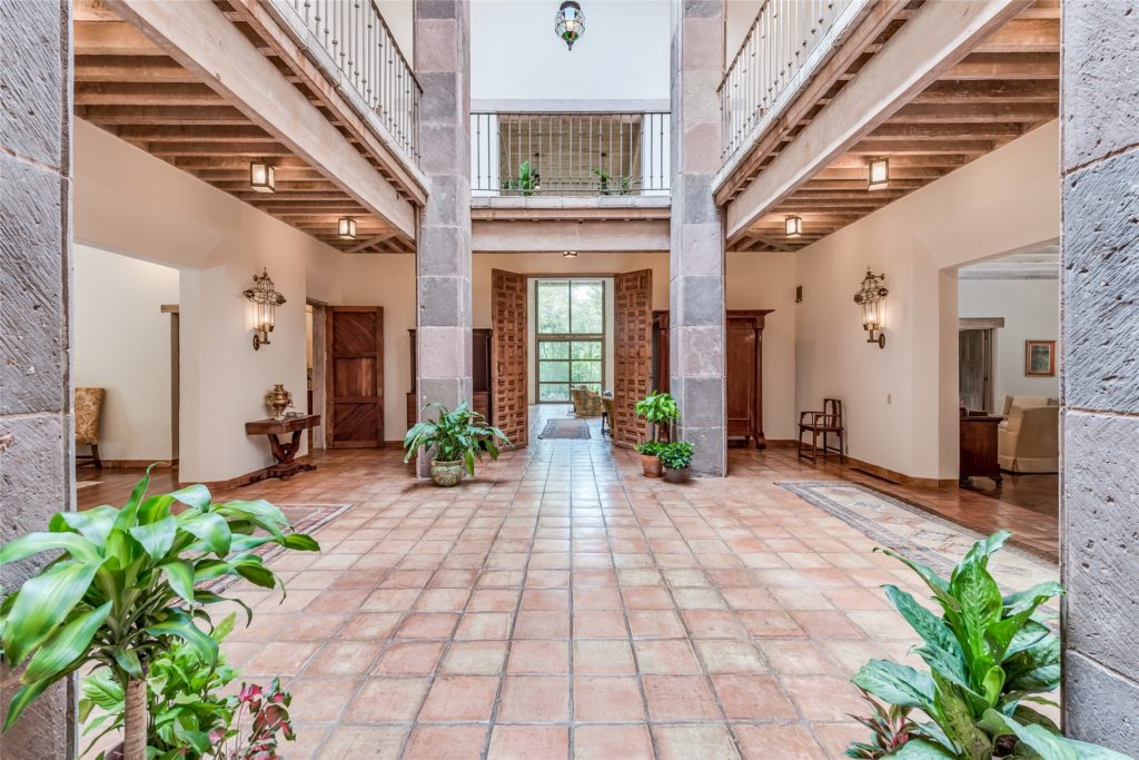 The vast central atrium of the home at 3 Longbow Lane. (Photo by Patrick Bertolino for Sotheby's International Realty)