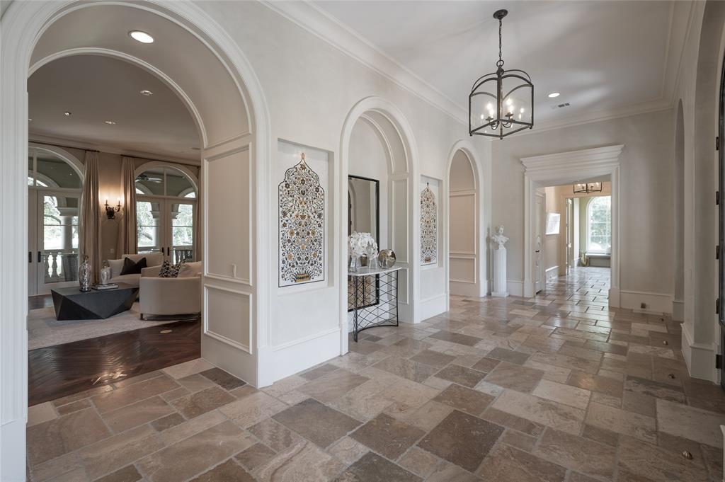 This expansive Italian villa was designed by renowned Houston architect Robert Dame and built by Hahnfeld Witmer Davis in 2007.