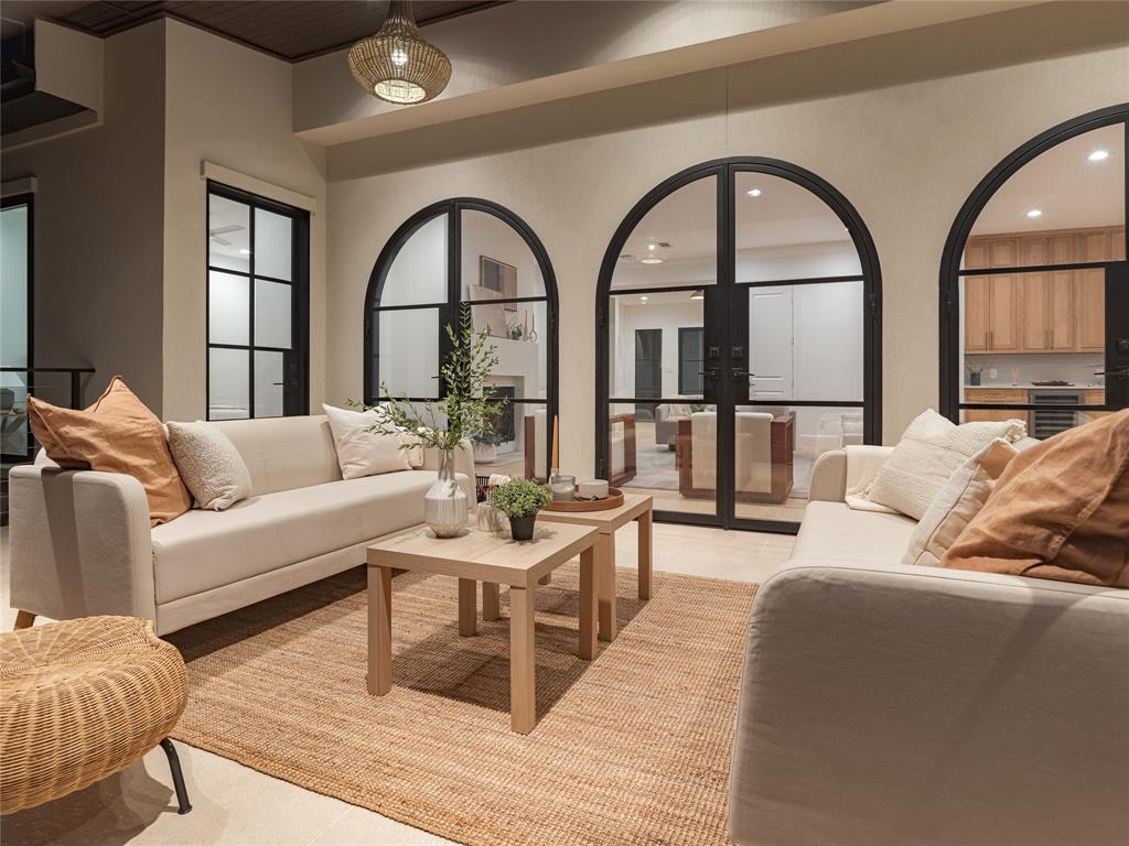 The three striking arched steel doors in the evening.