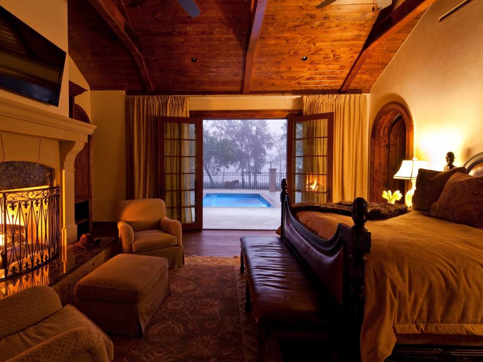 Bedrooms in the Inn at Dos Brisas haciendas open to the plunge pool. (Photo by Julie Soefer)