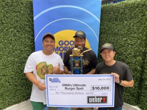 Trill Burgers partners Andy Nguyen and Bun B with chef Mike Pham and the Golden Burger Trophy_photo by Scurfield Group