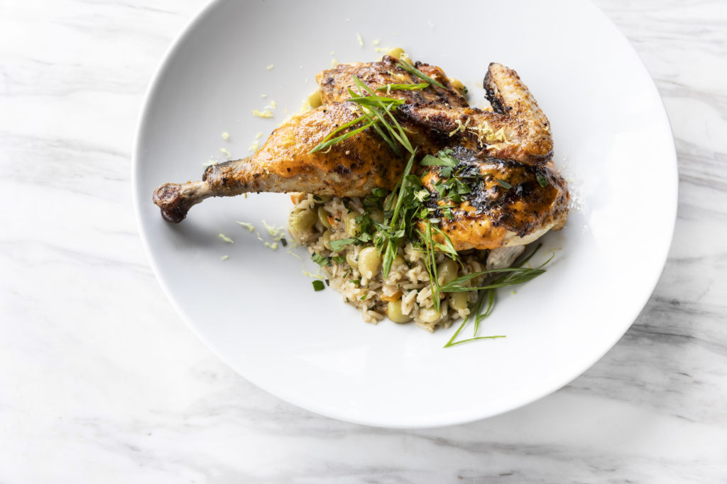 If you want other options besides beef, there's Fried Holmes Chicken on the menu served with dirty rice. Photo by Julie Soefer.