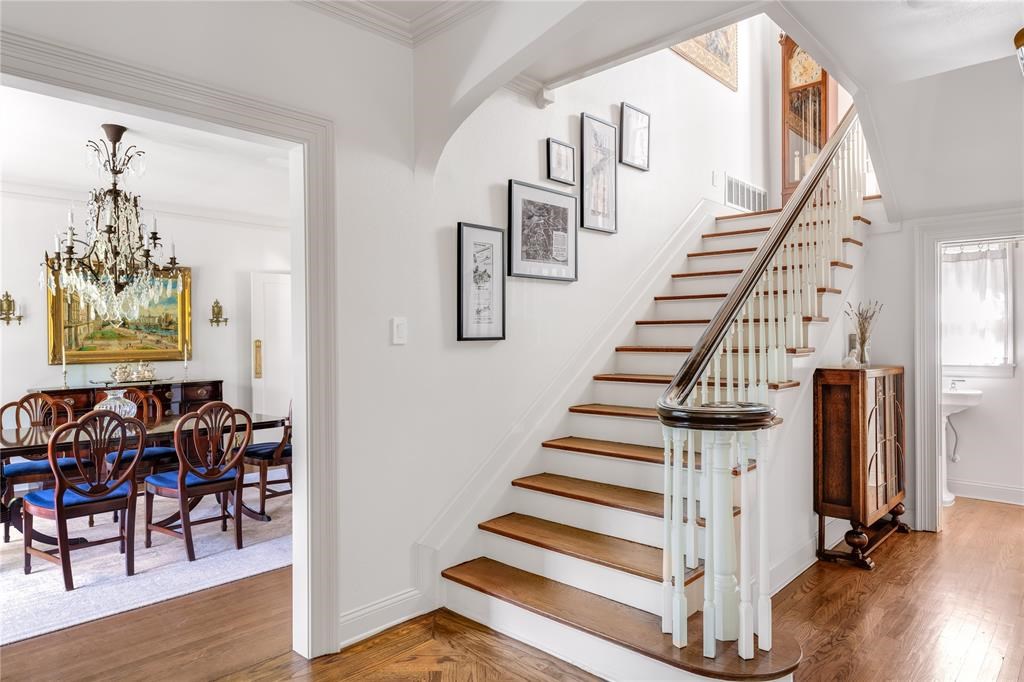 A peek of the powder room on the right side of the stairs. 