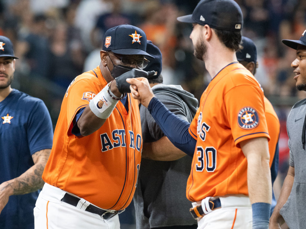 Astros manager Dusty Baker is always ready to give someone like Kyle Tucker knuckles. (Photo by F. Carter Smith)