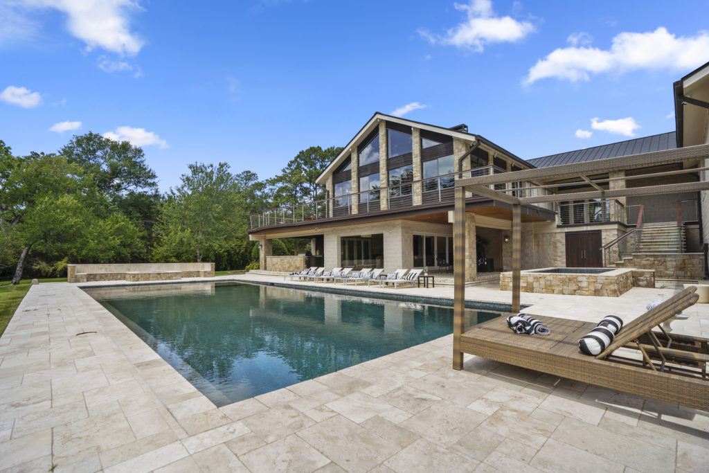 The resort style pool terrace at 405 W. Spreading Oaks Avenue in Friendswood, the mansion originally designed for power house attorney Tony Buzbee.
