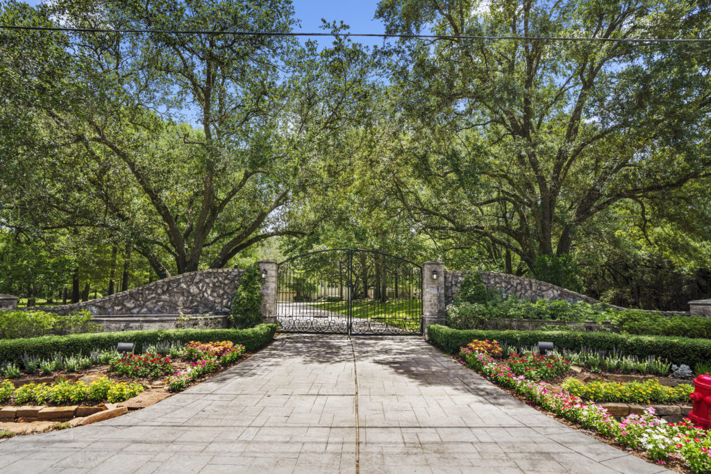 Entry to the 10-acre estate at 405 W. Spreading Oaks Avenue, former home of Tony Buzbee, in Friendswood.