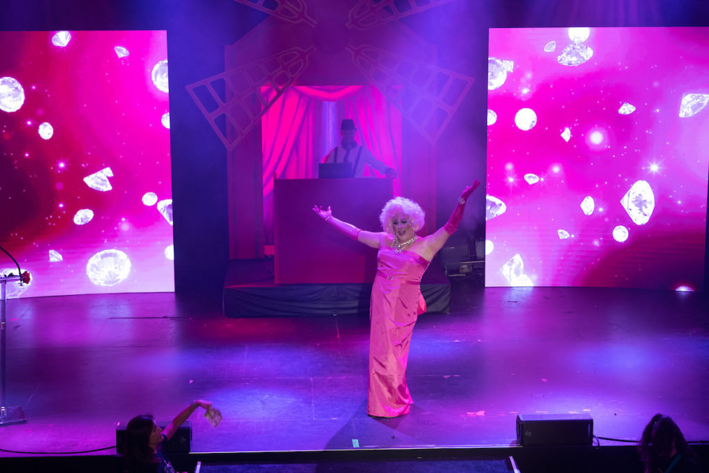 Ginger Grant channeling Marilyn Monroe on stage at White Oak Music Hall during Legacy's Moulin Rouge-themed fundraiser. (Photo by Daniel Ortiz)