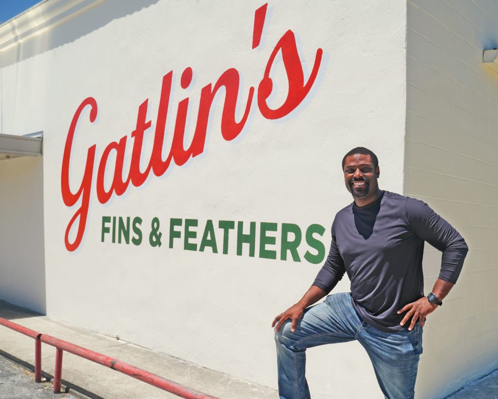Owner Greg Gatlin outside his new Houston restaurant called Fins and Feathers in Independence Heights. (Photo by Lindsey Cooper)