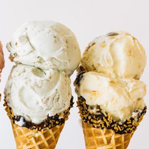 Ice Cream – MELT Ice Creams – Key Lime Pie on a chocolate dipped cone with toasted coconut.