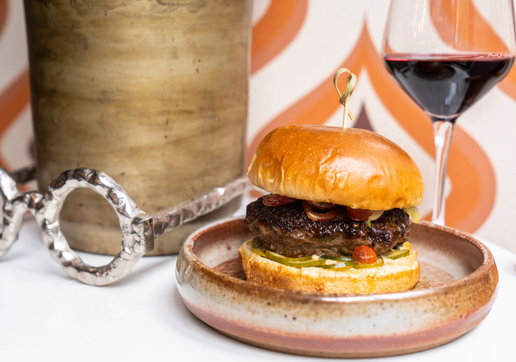 The "Juicy Lucy" Burger is a 6-ounce burger with beef culled from 44 Farms with Redneck cheddar and dijonaise.  (Photo by Michael Anthony)