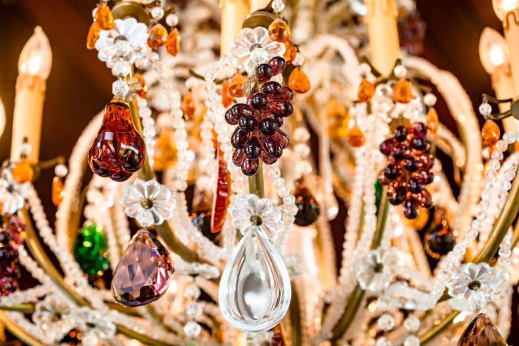 Colorful detailing of the more than one dozen vintage chandeliers that grace the Frida Private Room at Flora. (Photo by Kirsten Gilliam)