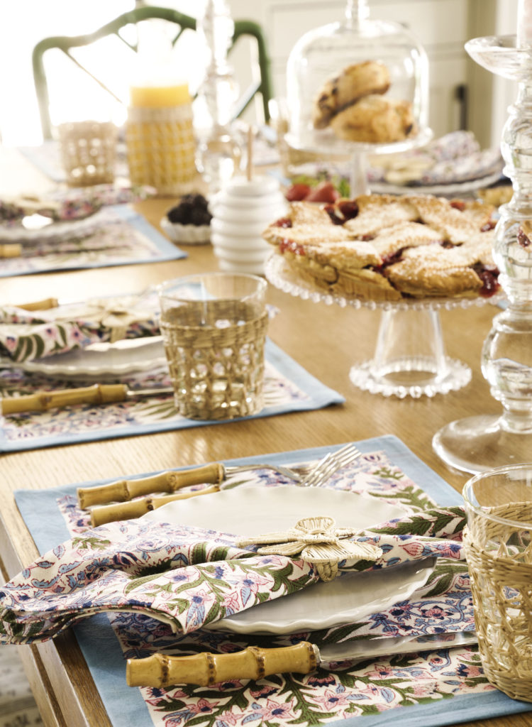 The breakfast table setting is a mix of Julia Amory linens and dishes from travels to San Miguel de Allende. (Photo by Jack Thompson)