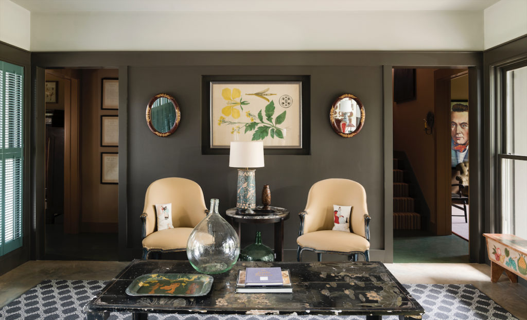 The living room chairs are Napoleon III, re-covered in ochre-color wool. Brown made the coffee table from an antique coromandel screen. (Photo by Jack Thompson)