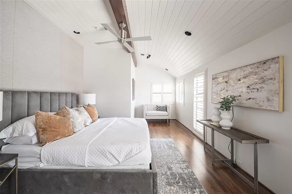 The home's bedrooms look like cozy hotel retreats.