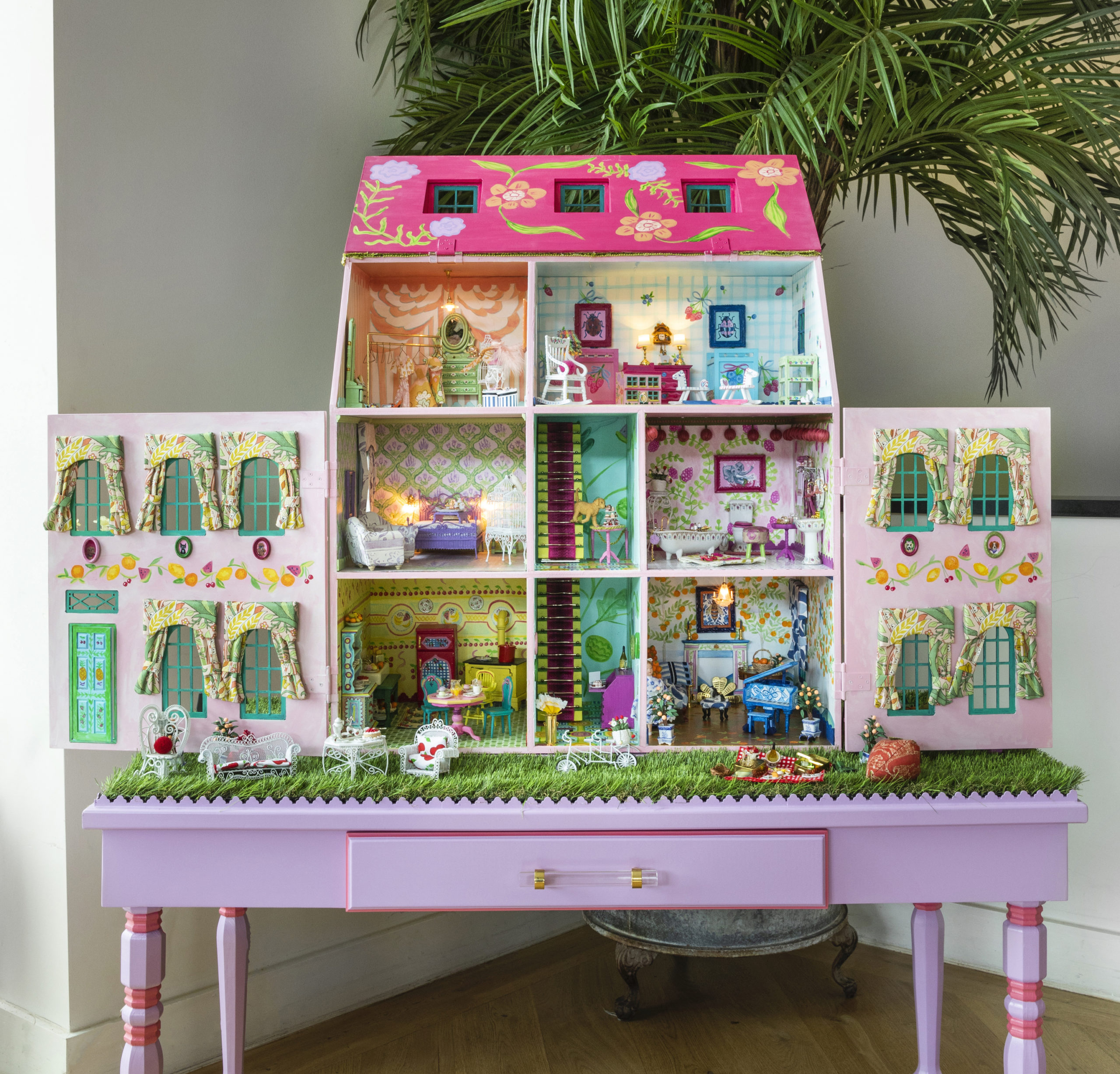 Creative Tonic's Courtnay Elias and Houston artist Andrea Condara partnered on the design of their dollhouse for A Shelter for Cancer Families's gala auction. (Photo by Claudia Casbarian for Julie Soefer)