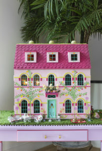 The traditional dollhouse is one of three designs by Newbury Architecture, constructed by Stetzer Builders, for A Shelter for Cancer Families’ gala auction. (Photo by Claudia Casbarian for Julie Soefer)