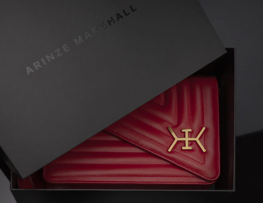 The Oma Bag is available in nude and red. (Photo by @vdm_photographer)