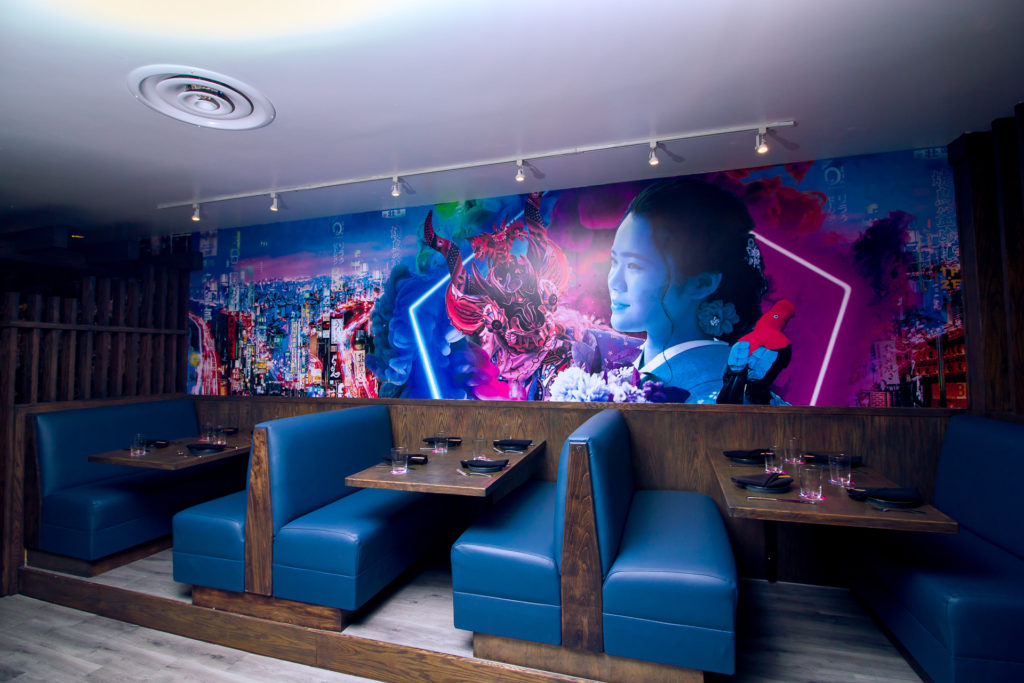 A colorful mural in the dining area depicts the Japanese' influence on Peruvian culture. (Photo by Marco Torres)