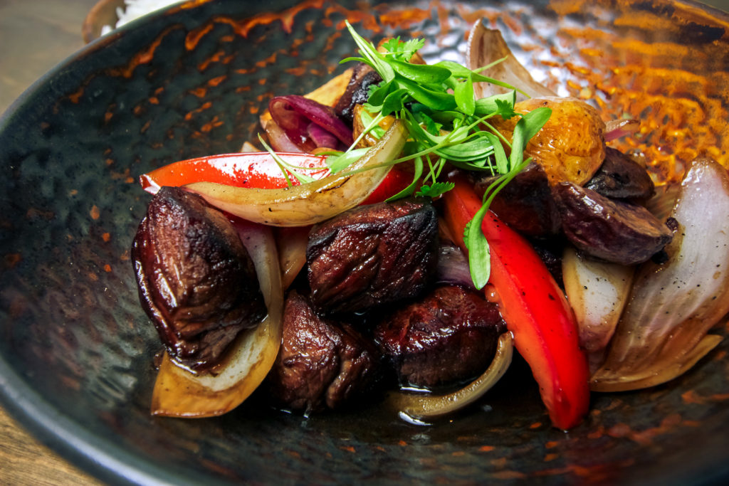 One of the few red meat dishes on the menu of Pacha Nikkei is the classic Peruvian dish of Lomo Saltado made with beef tenderloin. Photo by Marco Torres