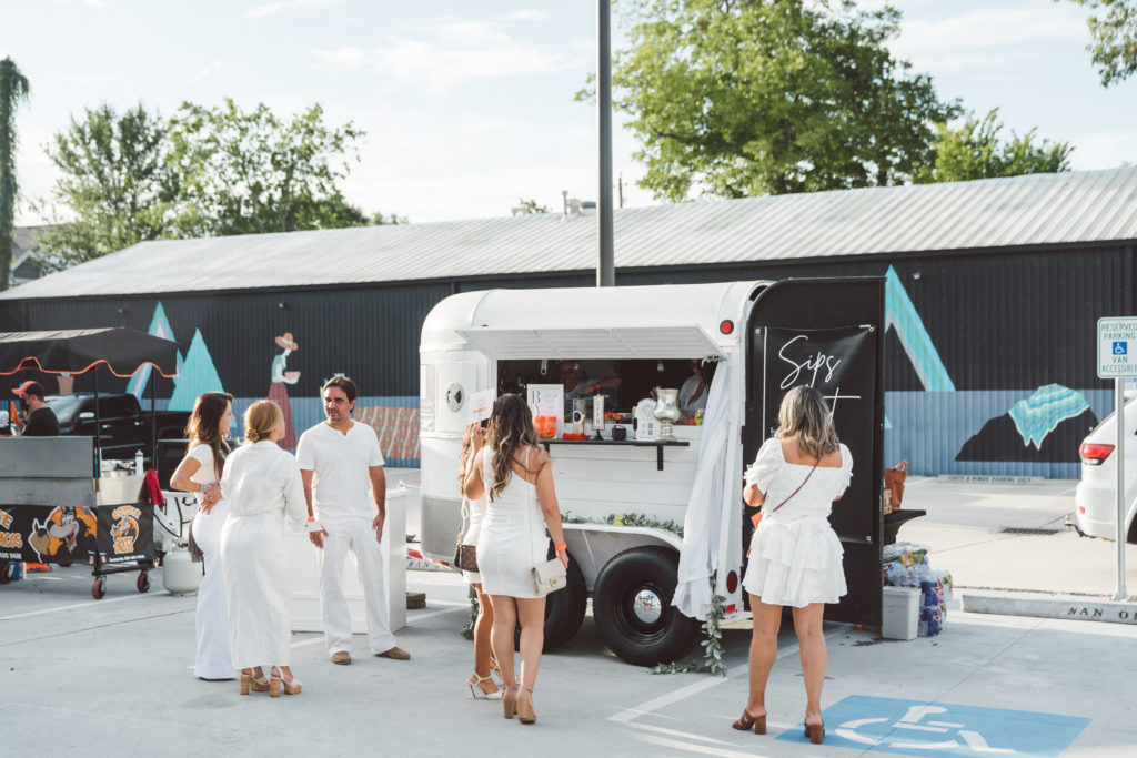 The Wild Pony Express bar was part of the  fun at the Nan & Company Properties White Linen Night in The Heights party. (Photo by Nan Studios)