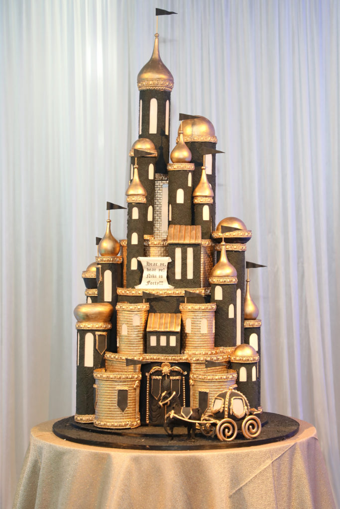 The magical castle birthday cake by Good Gosh Ganache at Nicole Lassiter's 40th birthday party at Hotel ZaZa. (Photo by Priscilla Dickson) 